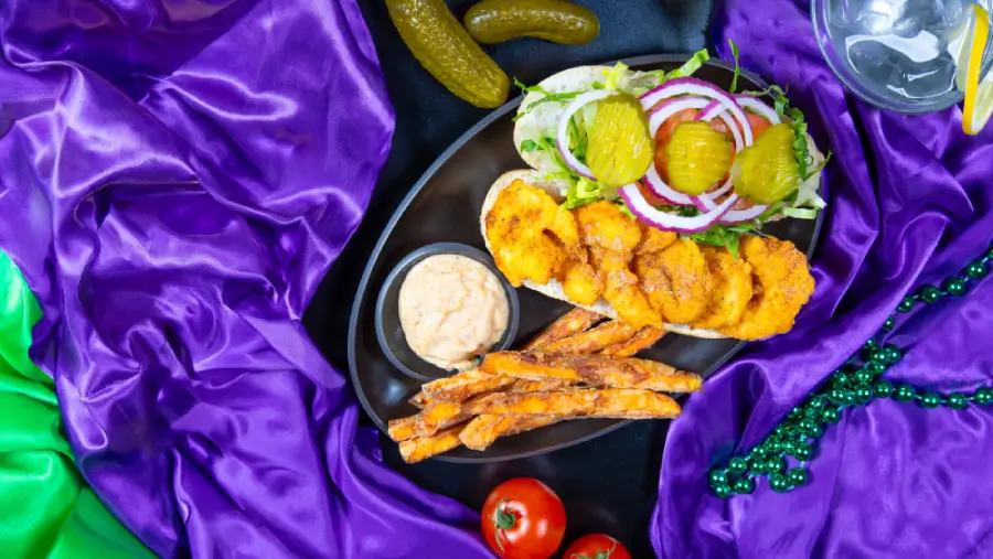 North of the Bayou Fried Seafood Po'boy - crispy fried shrimp, catfish, and seasoned toppings served in a traditional po'boy sandwich at North of the Bayou Brewery in Madison, WI